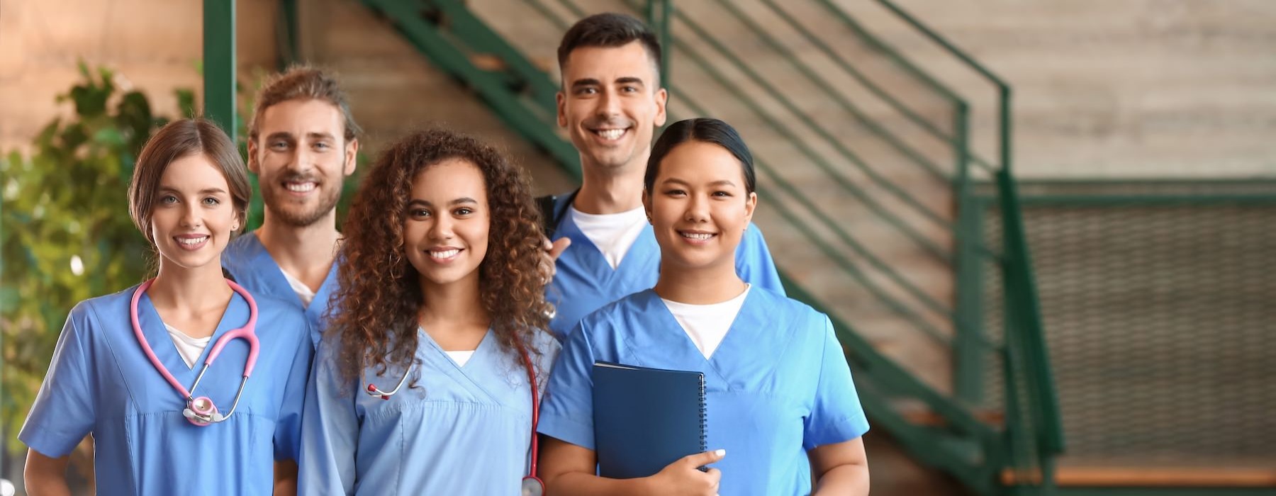 a group of medical professionals posing for a picture