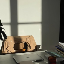 desk set up with laptop near plant