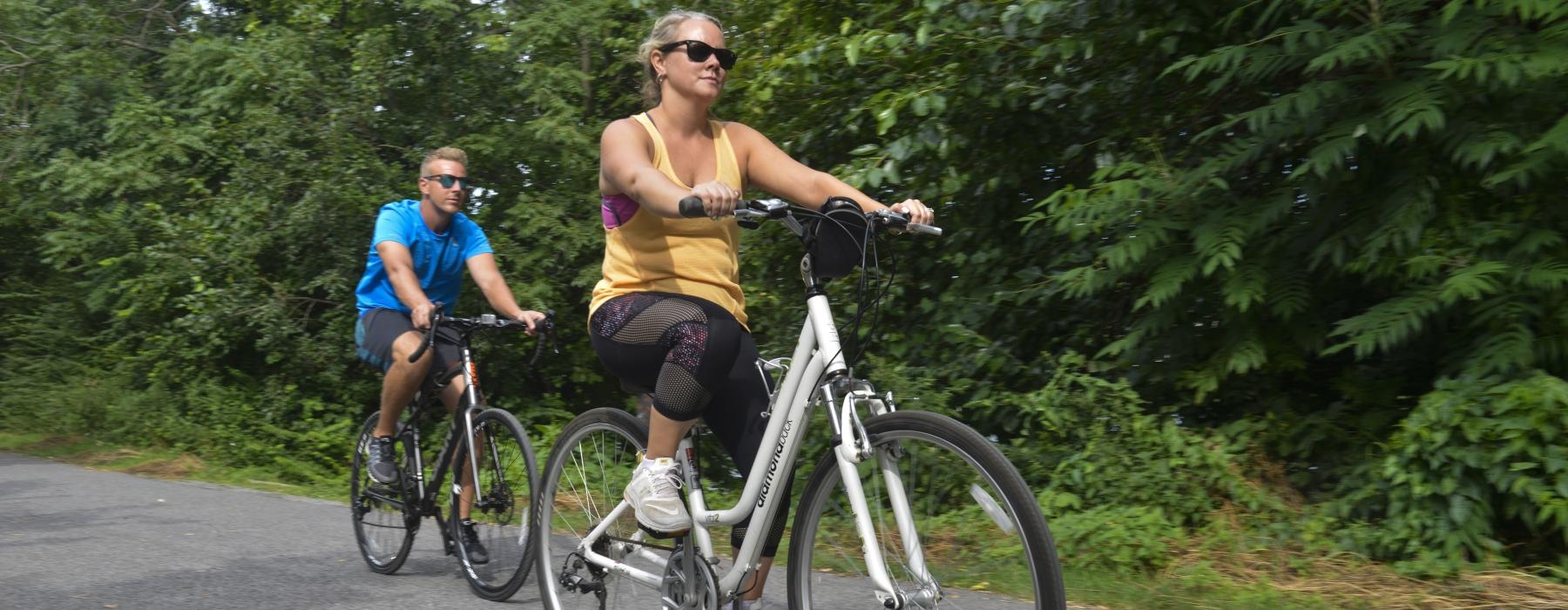 a group of people riding bikes