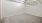 a room with a white wall and a white ceiling
