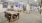 a large room with a table and chairs