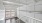 a white room with a white railing